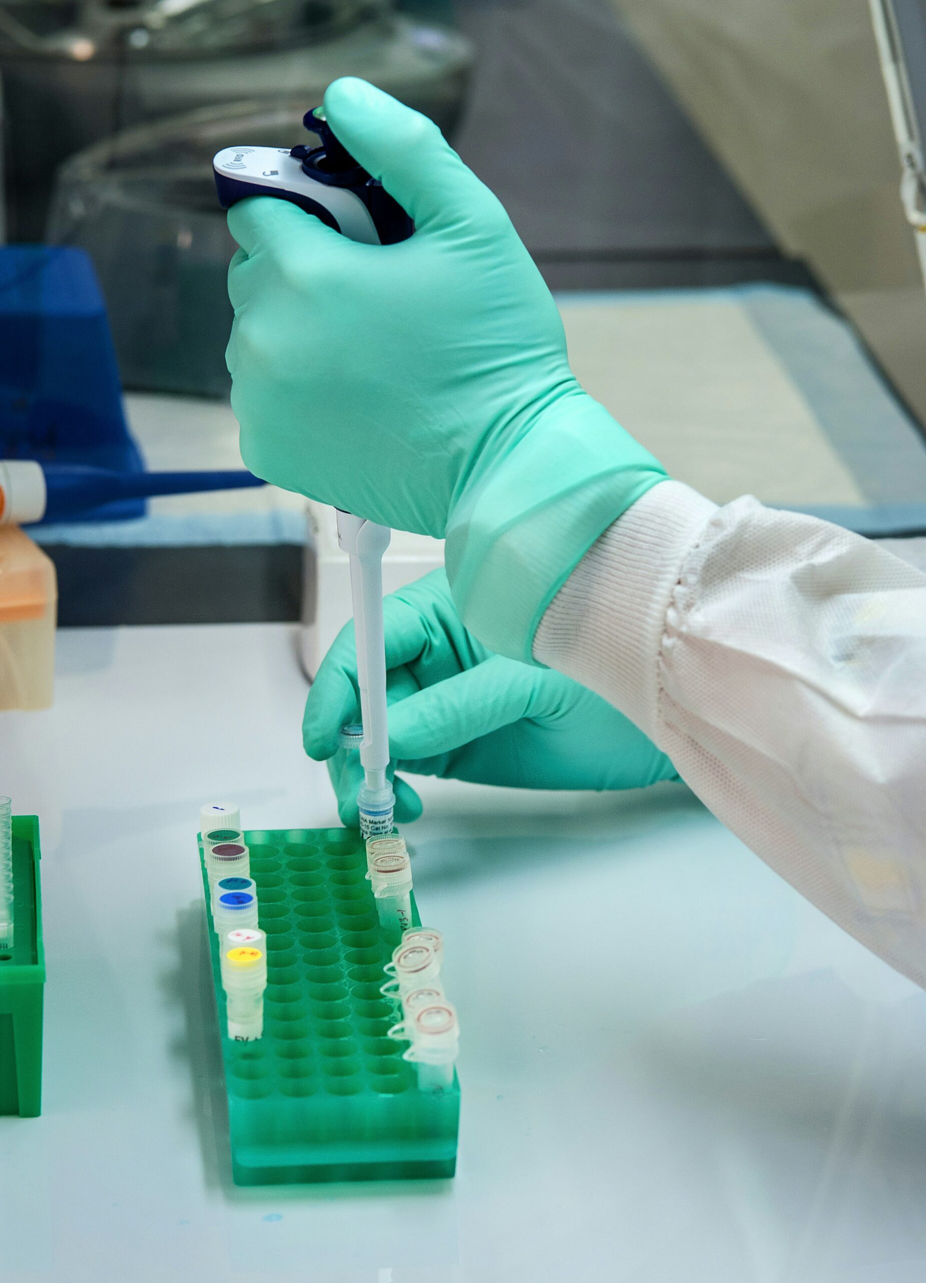 Pipetting samples for GT Molecular assays and testing services