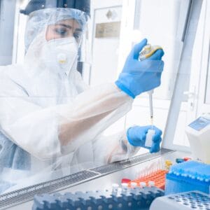 Laboratory scientist processing samples for GT Molecular wastewater PCR testing service